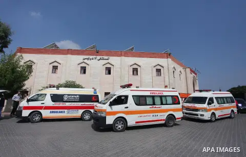 Palestinian ambulance drivers take part in a protest against the siege on the Gaza Strip, outside Indonesian hospital, in the northern of Gaza Strip on July 17, 2018. Photo by Mahmoud Ajour