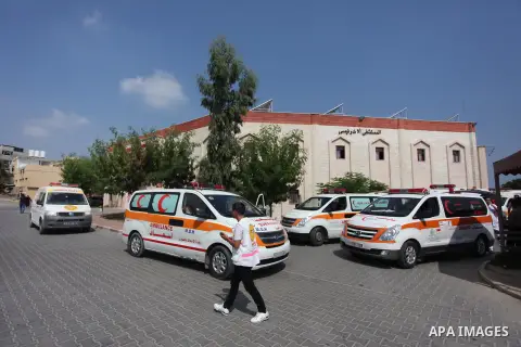 Palestinian ambulance drivers take part in a protest against the siege on the Gaza Strip, outside Indonesian hospital, in the northern of Gaza Strip on July 17, 2018. Photo by Mahmoud Ajour
