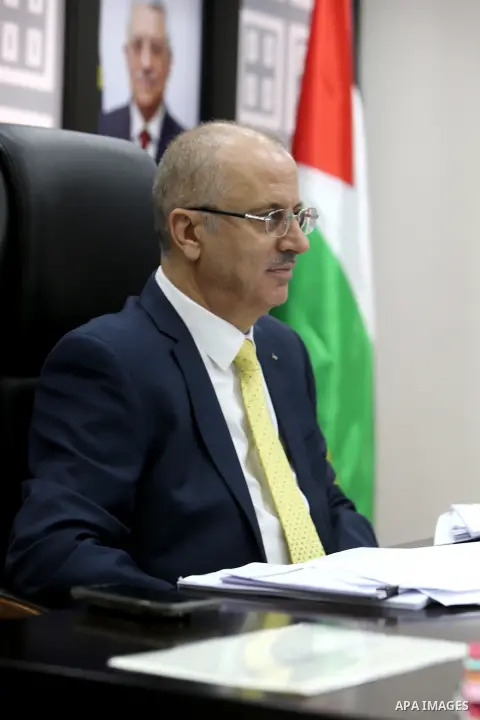 Palestinian Prime Minister Rami Hamdallah chairs a meeting with council of Ministers in the West Bank city of Ramallah on July 17, 2018. Photo by Prime Minister Office