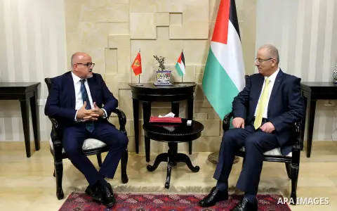 Palestinian Prime Minister Rami Hamdallah meets with Minister for Foreign Affairs of Montenegro, Sirjan Darmanwick in the West Bank city of Ramallah on July 17, 2018. Photo by Prime Minister Office