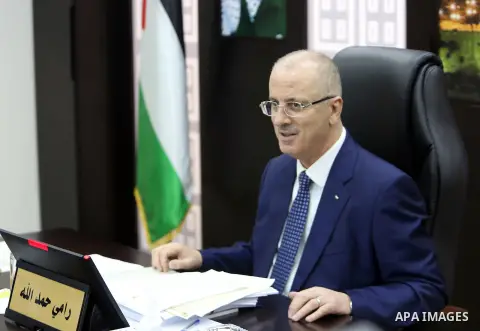 Palestinian Prime Minister Rami Hamdallah chairs a meeting with council of Ministers in the West Bank city of Ramallah on July 24, 2018. Photo by Prime Minister Office