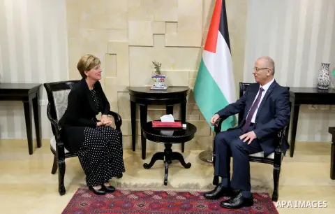 Palestinian Prime Minister, Rami Hamdallah, meets with Canadian International Development Minister Marie-Claude Bebo, in the West Bank city of Ramallah, on July 26, 2018. Photo by Prime Minister Office