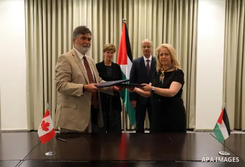 Palestinian Prime Minister, Rami Hamdallah, meets with Canadian International Development Minister Marie-Claude Bebo, in the West Bank city of Ramallah, on July 26, 2018. Photo by Prime Minister Office