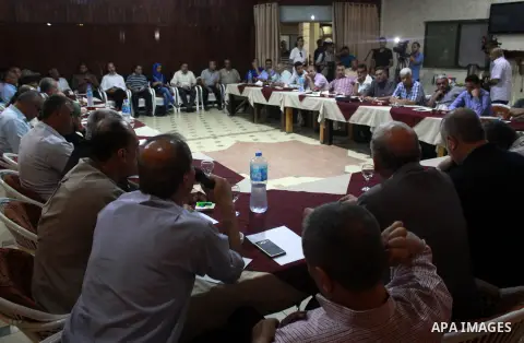 Palestinian faction members attend a meeting in Gaza city, on July 26, 2018. Photo by Bashar Zakri