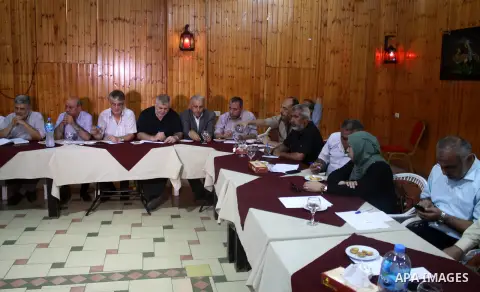 Palestinian faction members attend a meeting in Gaza city, on July 26, 2018. Photo by Bashar Zakri