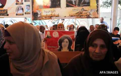 Palestinians take part in a protest to show solidarity with Palestinian prisoners held in Israeli jails, in front of Red cross office in Gaza city on July 30, 2018. Photo by Mahmoud Ajour
