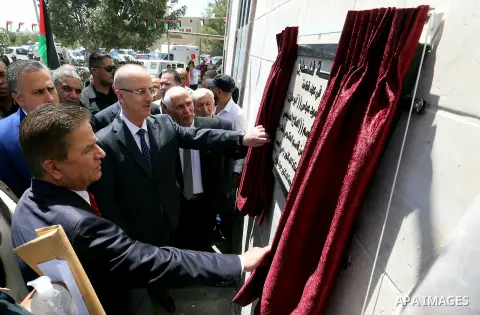 Palestinian Prime Minister Rami Hamdallah opens departments in Hebron hospitals, in the West Bank city of Hebron, on Aug. 01, 2018. Photo by Prime Minister Office