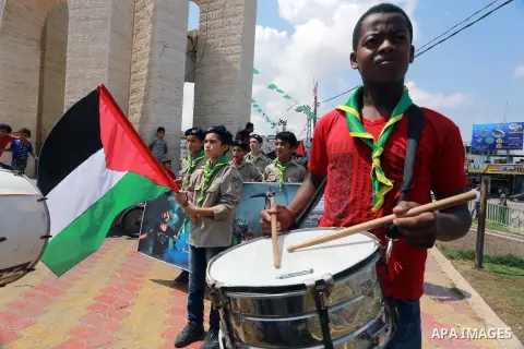 Palestinian scouts take part in a march "The Great Return March", in Rafah in the southern of Gaza strip, on Aug. 02, 2018. Photo by Abed Rahim Khatib