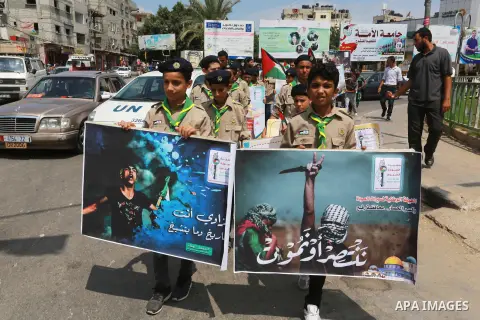 Palestinian scouts take part in a march "The Great Return March", in Rafah in the southern of Gaza strip, on Aug. 02, 2018. Photo by Abed Rahim Khatib