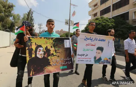 Palestinian scouts take part in a march "The Great Return March", in Rafah in the southern of Gaza strip, on Aug. 02, 2018. Photo by Abed Rahim Khatib