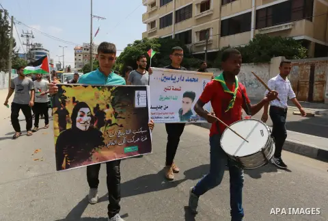 Palestinian scouts take part in a march "The Great Return March", in Rafah in the southern of Gaza strip, on Aug. 02, 2018. Photo by Abed Rahim Khatib