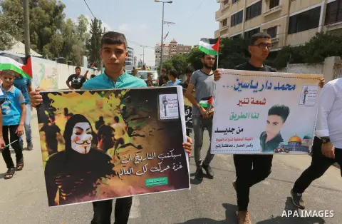 Palestinian scouts take part in a march "The Great Return March", in Rafah in the southern of Gaza strip, on Aug. 02, 2018. Photo by Abed Rahim Khatib