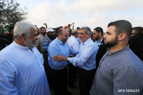 Hamas leader Izzat al-Rishq takes part during tents protest where Palestinian demand the right to return to their homeland at the Israel-Gaza border, in al-Bureij, in the center of Gaza Strip on Aug. 03, 2018. Photo by M...