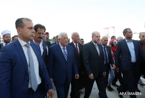 Palestinian President Mahmoud Abbas inspects City of pilgrims, in the West Bank of Jericho, on Aug. 06, 2018. Photo by Shadi Hatem