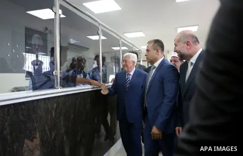 Palestinian President Mahmoud Abbas inspects City of pilgrims, in the West Bank of Jericho, on Aug. 06, 2018. Photo by Shadi Hatem