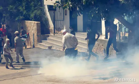Israeli forces take position during clashes with Palestinian protesters following a weekly demonstration against the expropriation of Palestinian land by Israel in the village of Kfar Qaddum, near the West Bank city of N...