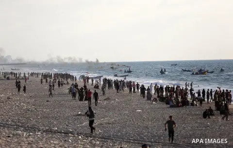 Palestinian protesters sail with boats during a demonstration against the Israeli blockade on Gaza Strip, along the Gaza sea barrier on the maritime border with Israel near Kibbutz Zikim, north of Beit Lahia in the north...
