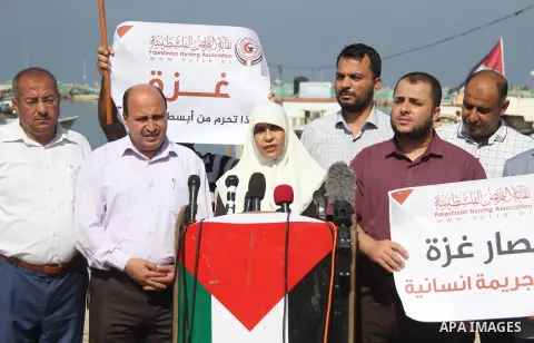 Palestinian members of the National Commission to break the siege, attend a press conference at the seaport in Gaza city on September 23, 2018. Photo by Mahmoud Ajour
