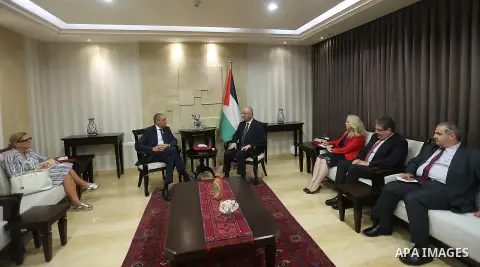Palestinian Prime Minister, Rami Hamdallah, meets with EU representative to Palestine Ralph Trav, in the West Bank city of Ramallah on September 23, 2018. Photo by Prime Minister Office