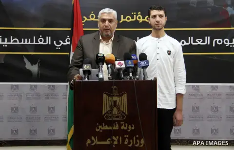 Chairman of the Governmental information office in Gaza Strip Salama Ma'ruf speaks during a press conference in Gaza city on September 26, 2018. Photo by Mahmoud Ajour