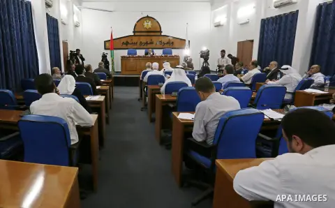 Members of the Palestinian legislative council from Hamas movement attend a meeting at the legislative council, in Gaza city, on September 26, 2018. Photo by Ashraf Amra