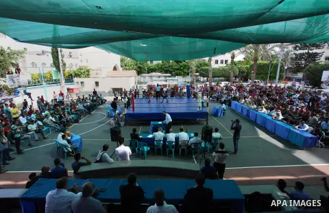 Palestinian fighters compete during the first individual boxing tournament at the University College of Applied Sciences "UCAS" in Gaza city, on September 30, 2018. Photo by Mahmoud Ajjour