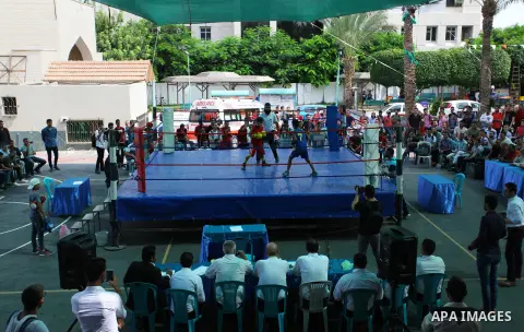 Palestinian fighters compete during the first individual boxing tournament at the University College of Applied Sciences "UCAS" in Gaza city, on September 30, 2018. Photo by Mahmoud Ajjour