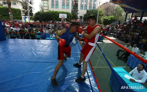 Palestinian fighters compete during the first individual boxing tournament at the University College of Applied Sciences "UCAS" in Gaza city, on September 30, 2018. Photo by Mahmoud Ajjour