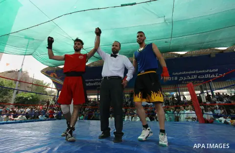 Palestinian fighters compete during the first individual boxing tournament at the University College of Applied Sciences "UCAS" in Gaza city, on September 30, 2018. Photo by Mahmoud Ajjour