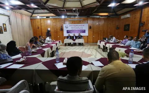 Khaled al-Batsh, senior leader of the Islamic Jihad movement, head of the supreme commission for the "Great Return March" and Senior Hamas leader Ismail Radwan, attend the political symposium, in Gaza city on October 16,...