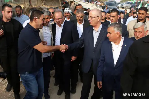Palestinian Prime Minister Rami Hamdallah visits the Palestinian Bedouin village of Khan al-Ahmar, in the occupied West Bank on October 18, 2018. Photo by Shadi Hatem
