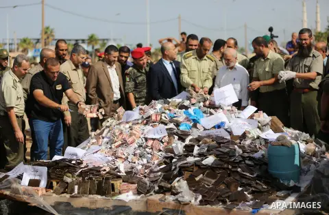 Members of Palestinian anti-drug police burn drugs during the annual conference for the destruction of narcotics, in Gaza City on October 22, 2018. Photo by Ashraf Amra