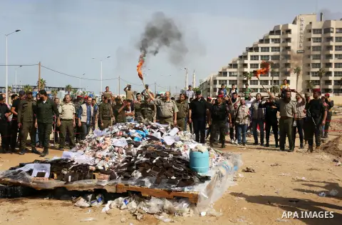 Members of Palestinian anti-drug police burn drugs during the annual conference for the destruction of narcotics, in Gaza City on October 22, 2018. Photo by Ashraf Amra