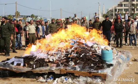Members of Palestinian anti-drug police burn drugs during the annual conference for the destruction of narcotics, in Gaza City on October 22, 2018. Photo by Ashraf Amra