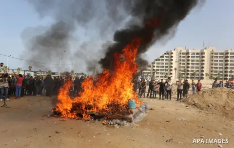 Members of Palestinian anti-drug police burn drugs during the annual conference for the destruction of narcotics, in Gaza City on October 22, 2018. Photo by Ashraf Amra