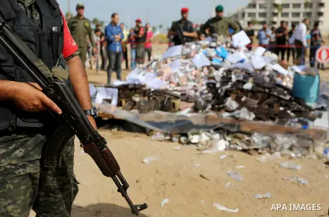 Members of Palestinian anti-drug police burn drugs during the annual conference for the destruction of narcotics, in Gaza City on October 22, 2018. Photo by Ashraf Amra