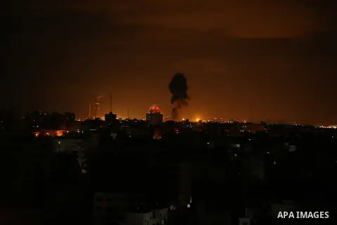 A picture taken on on October 27, 2018 shows a fireball exploding during Israeli air strikes in Gaza City. Photo by Dawoud Abo Alkas