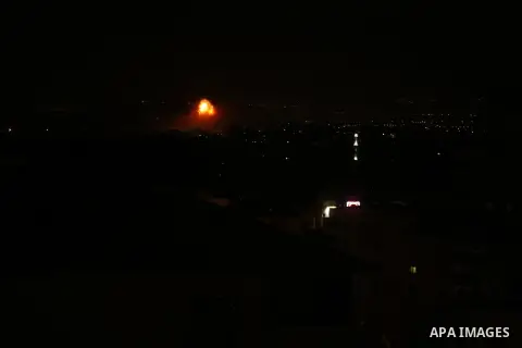 A picture taken on on October 27, 2018 shows a fireball exploding during Israeli air strikes in Gaza City. Photo by Dawoud Abo Alkas
