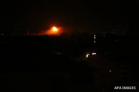 A picture taken on on October 27, 2018 shows a fireball exploding during Israeli air strikes in Gaza City. Photo by Dawoud Abo Alkas