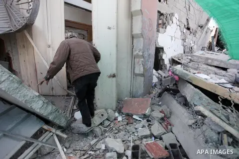 A Palestinian man inspects the damaged of his house following an Israeli air strike on Gaza City on October 27, 2018. A barrage of rockets from Gaza hit Israel overnight, the Israeli army said on October 27, with Israel...