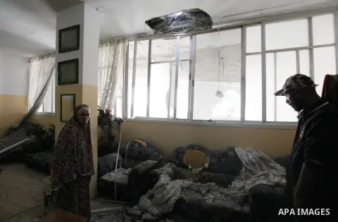 Palestinians inspect the damaged of their house following an Israeli air strike on Gaza City on October 27, 2018. A barrage of rockets from Gaza hit Israel overnight, the Israeli army said on October 27, with Israel reta...