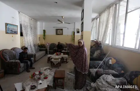 Palestinians inspect the damaged of their house following an Israeli air strike on Gaza City on October 27, 2018. A barrage of rockets from Gaza hit Israel overnight, the Israeli army said on October 27, with Israel reta...