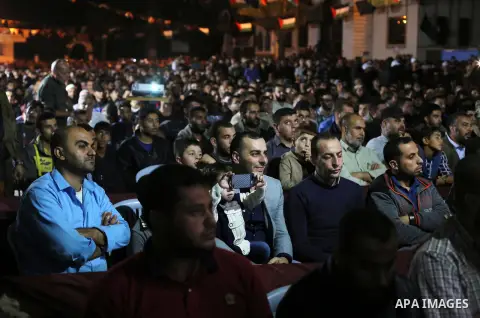 Palestinian supporters of Islamic Jihad movement attends a memorial service for Islamic Jihad militants who were killed in an Israeli operation to blow up a tunnel last year, at the Bureij refugee camp, in central Gaza S...