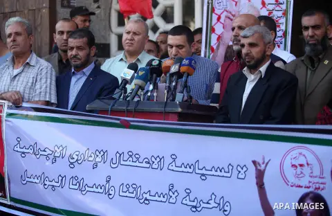 Palestinians take part a protest to show solidarity with the Leftist Legislator Khaleda Jarrar, held in Israeli jails in Gaza city on November 1, 2018. Photo by Mahmoud Ajjour