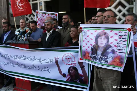 Palestinians take part a protest to show solidarity with the Leftist Legislator Khaleda Jarrar, held in Israeli jails in Gaza city on November 1, 2018. Photo by Mahmoud Ajjour