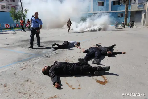 Palestinian policemen take part in a drill, organized by Ministry of Interior and National Security, in Gaza city on November 1, 2018. Photo by Ashraf Amra