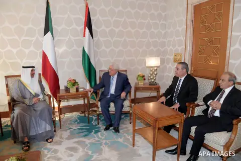 Palestinian President Mahmoud Abbas meets with Kuwaiti parliament speaker Marzouq al-Ghanim, in Kuwait City on November 13, 2018. Photo by Thaer Ganaim