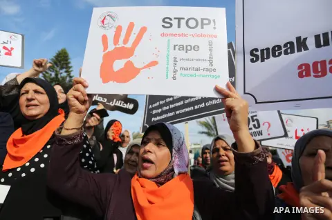 Palestinian women take part during a protest against violence towards women in Gaza city, on November 21, 2018. Photo by Ashraf Amra