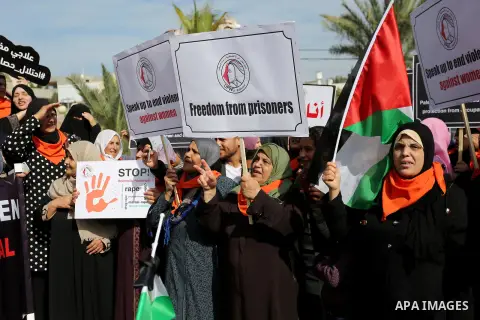 Palestinian women take part during a protest against violence towards women in Gaza city, on November 21, 2018. Photo by Ashraf Amra