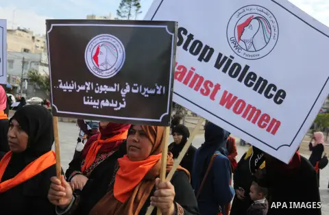 Palestinian women take part during a protest against violence towards women in Gaza city, on November 21, 2018. Photo by Ashraf Amra